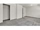 Spacious bedroom featuring a sliding door closet and carpet flooring at 5661 Brimstone Hill Ave, Las Vegas, NV 89141