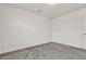 Bedroom featuring neutral paint, gray carpet, and an electrical outlet at 5661 Brimstone Hill Ave, Las Vegas, NV 89141