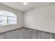 Bedroom featuring carpet flooring, white walls and trim, and natural light at 5661 Brimstone Hill Ave, Las Vegas, NV 89141