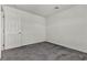 Standard bedroom with neutral paint and gray carpet at 5661 Brimstone Hill Ave, Las Vegas, NV 89141