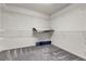Spacious walk-in closet with shelving and carpet flooring at 5661 Brimstone Hill Ave, Las Vegas, NV 89141