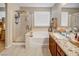 Bathroom features soaking tub, separate shower, and granite countertops at 5854 Willow Trace Ave, Las Vegas, NV 89139