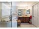 Bathroom featuring granite countertops, dual sinks, and separate shower at 5854 Willow Trace Ave, Las Vegas, NV 89139