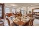 Formal dining room with elegant decor, a large dining table and tile flooring at 5854 Willow Trace Ave, Las Vegas, NV 89139