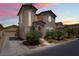 Charming two-story home with a well-maintained lawn and lush landscaping for great curb appeal at 5854 Willow Trace Ave, Las Vegas, NV 89139