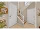 Welcoming foyer with staircase, tile flooring, and neutral paint at 5854 Willow Trace Ave, Las Vegas, NV 89139