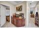 Hallway area with wood cabinets and access to other rooms at 5854 Willow Trace Ave, Las Vegas, NV 89139