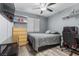 Bedroom with wood-look flooring, closet, work desk, and natural light at 5937 Round Castle St, Las Vegas, NV 89130