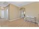 Open bonus room featuring light wood floors, a desk, bright windows and white trim at 6049 Paddleboat St, North Las Vegas, NV 89031