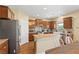Well-equipped kitchen with stainless steel appliances, stylish backsplash, and a central island at 6049 Paddleboat St, North Las Vegas, NV 89031