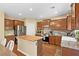 Well-equipped kitchen with stainless steel appliances and butcher block island at 6049 Paddleboat St, North Las Vegas, NV 89031
