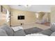 Relaxing living room with modern decor and entertainment center at 6049 Paddleboat St, North Las Vegas, NV 89031