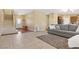 Open concept living room connecting to the kitchen and foyer at 6049 Paddleboat St, North Las Vegas, NV 89031