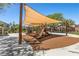 Playground with slides and shade structures, designed for outdoor recreation at 6049 Paddleboat St, North Las Vegas, NV 89031