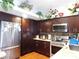 Kitchen featuring dark cabinets and stainless steel appliances at 6201 E Lake Mead Blvd # 218, Las Vegas, NV 89156