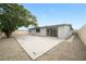 Spacious backyard with concrete patio and low-maintenance gravel landscaping at 6244 Parsifal Pl, Las Vegas, NV 89107