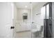 Modern bathroom boasts a glass shower, vanity with vessel sink, and updated fixtures at 6244 Parsifal Pl, Las Vegas, NV 89107