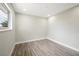 Empty bedroom with hardwood floors and window at 6244 Parsifal Pl, Las Vegas, NV 89107