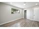 Bedroom features a ceiling fan, window, and closet at 6244 Parsifal Pl, Las Vegas, NV 89107