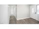 Bright entryway featuring hardwood floors and a decorative glass front door at 6244 Parsifal Pl, Las Vegas, NV 89107