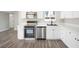 Modern kitchen featuring stainless steel appliances and ample counter space at 6244 Parsifal Pl, Las Vegas, NV 89107