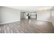 Open-concept living area with modern finishes, recessed lighting, and seamless flow to kitchen at 6244 Parsifal Pl, Las Vegas, NV 89107