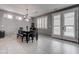 Modern dining area features a large window and contemporary decor at 6985 Hopi Summit Ct, Las Vegas, NV 89149