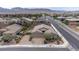 Attractive home featuring professional landscaping, a putting green, and ample parking at 6985 Hopi Summit Ct, Las Vegas, NV 89149