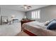 Spacious main bedroom features a ceiling fan and bright light at 6985 Hopi Summit Ct, Las Vegas, NV 89149