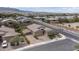 Charming home boasts a well-manicured front yard, large driveway, and inviting curb appeal at 6985 Hopi Summit Ct, Las Vegas, NV 89149