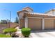 Delightful two-story home with an attached two-car garage, private entry, and tidy front yard at 7553 Durham Hall Ave # 201, Las Vegas, NV 89130