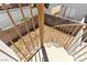 Exterior spiral staircase provides access to the upper level of this home at 7553 Durham Hall Ave # 201, Las Vegas, NV 89130