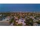 An impressive aerial view of the city skyline beyond the lush neighborhood at 7625 Coley Ave, Las Vegas, NV 89117