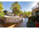 Grill and entertain guests at the outdoor stone bar in this well-manicured backyard at 7625 Coley Ave, Las Vegas, NV 89117