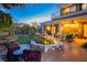 Relax in the spacious backyard featuring a water fountain, seating area, and well-maintained landscaping at 7625 Coley Ave, Las Vegas, NV 89117