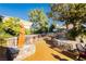 The outdoor dining area is perfect for Gathering meals and features a water fountain for soothing ambiance at 7625 Coley Ave, Las Vegas, NV 89117