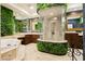 Spa-like bathroom featuring a glass shower and lush greenery walls at 7625 Coley Ave, Las Vegas, NV 89117