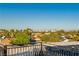 Views of the Las Vegas skyline are visible from this home's rooftop deck with solar panels at 7625 Coley Ave, Las Vegas, NV 89117