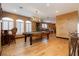 Spacious game room featuring a pool table, wood flooring, and shuttered windows at 7625 Coley Ave, Las Vegas, NV 89117