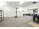 Spacious garage featuring a basketball hoop, ample storage, and plenty of room for activities at 7625 Coley Ave, Las Vegas, NV 89117