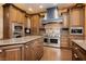 Chef's kitchen featuring stainless steel appliances and granite countertops at 7625 Coley Ave, Las Vegas, NV 89117