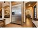 Gourmet kitchen boasts stainless steel appliances, and custom cabinets at 7625 Coley Ave, Las Vegas, NV 89117