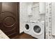 Well-equipped laundry room with modern washer and dryer set at 7625 Coley Ave, Las Vegas, NV 89117