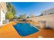 Private backyard pool with stone accents and a water feature, perfect for relaxation at 7625 Coley Ave, Las Vegas, NV 89117