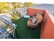 Cozy rooftop deck features a charming bistro table and chairs, perfect for enjoying outdoor living at 7625 Coley Ave, Las Vegas, NV 89117