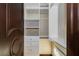 Well-organized walk-in closet with custom shelving and drawers for ample storage space at 7625 Coley Ave, Las Vegas, NV 89117