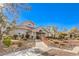 Charming clubhouse with inviting entrance and well-maintained landscaping at 7912 Foxwood Pl # 104, Las Vegas, NV 89145