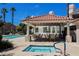 Pool area with hot tub and shaded outdoor seating, perfect for gatherings at 7912 Foxwood Pl # 104, Las Vegas, NV 89145