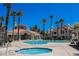 Resort-style pool area with spa and plenty of lounge chairs, ideal for relaxation at 7912 Foxwood Pl # 104, Las Vegas, NV 89145