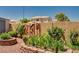 View of the backyard landscaping with privacy walls at 7920 Aviano Pines Ave, Las Vegas, NV 89129